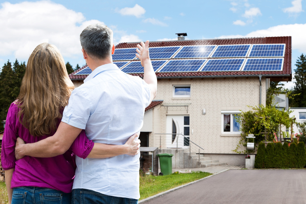 Family enjoying new solar panels installed by Hamro Solar LLC, showcasing clean energy and sustainability.